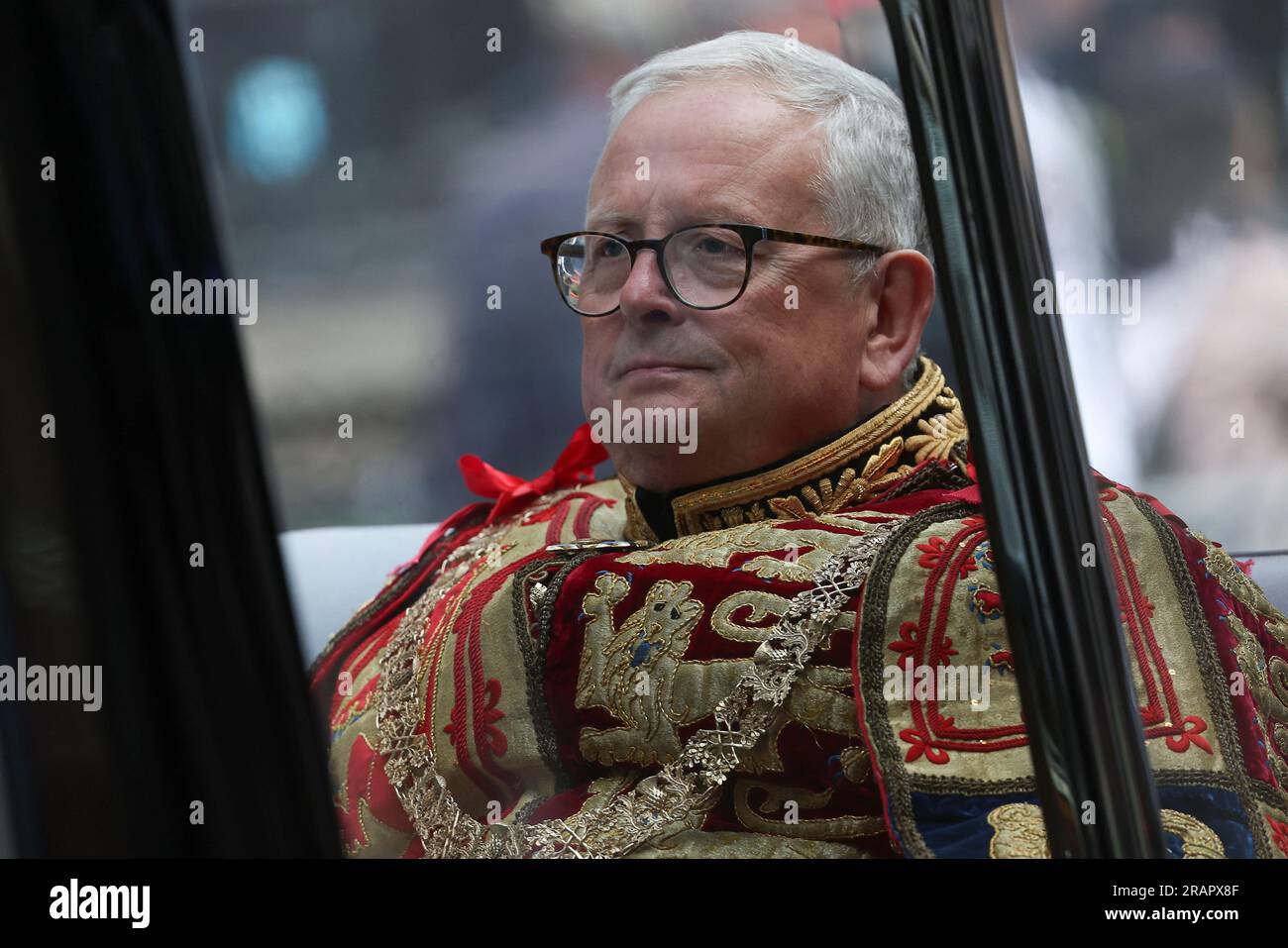 Lord Lyon King of Arms Joseph Morrow makes his way along the Royal Mile