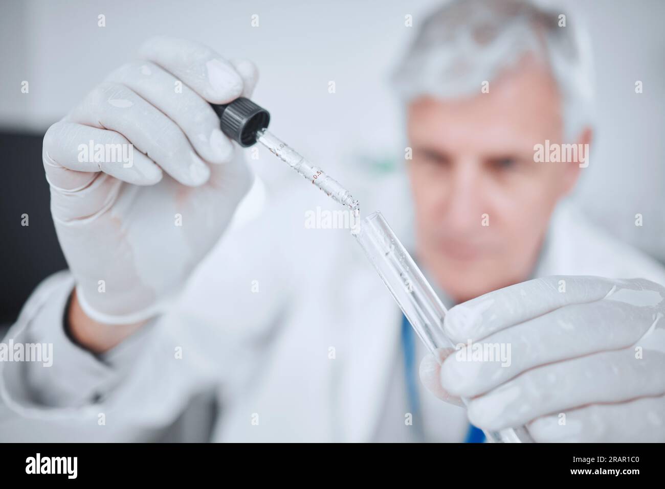 Laboratory, science and man with pipette checking results of medical