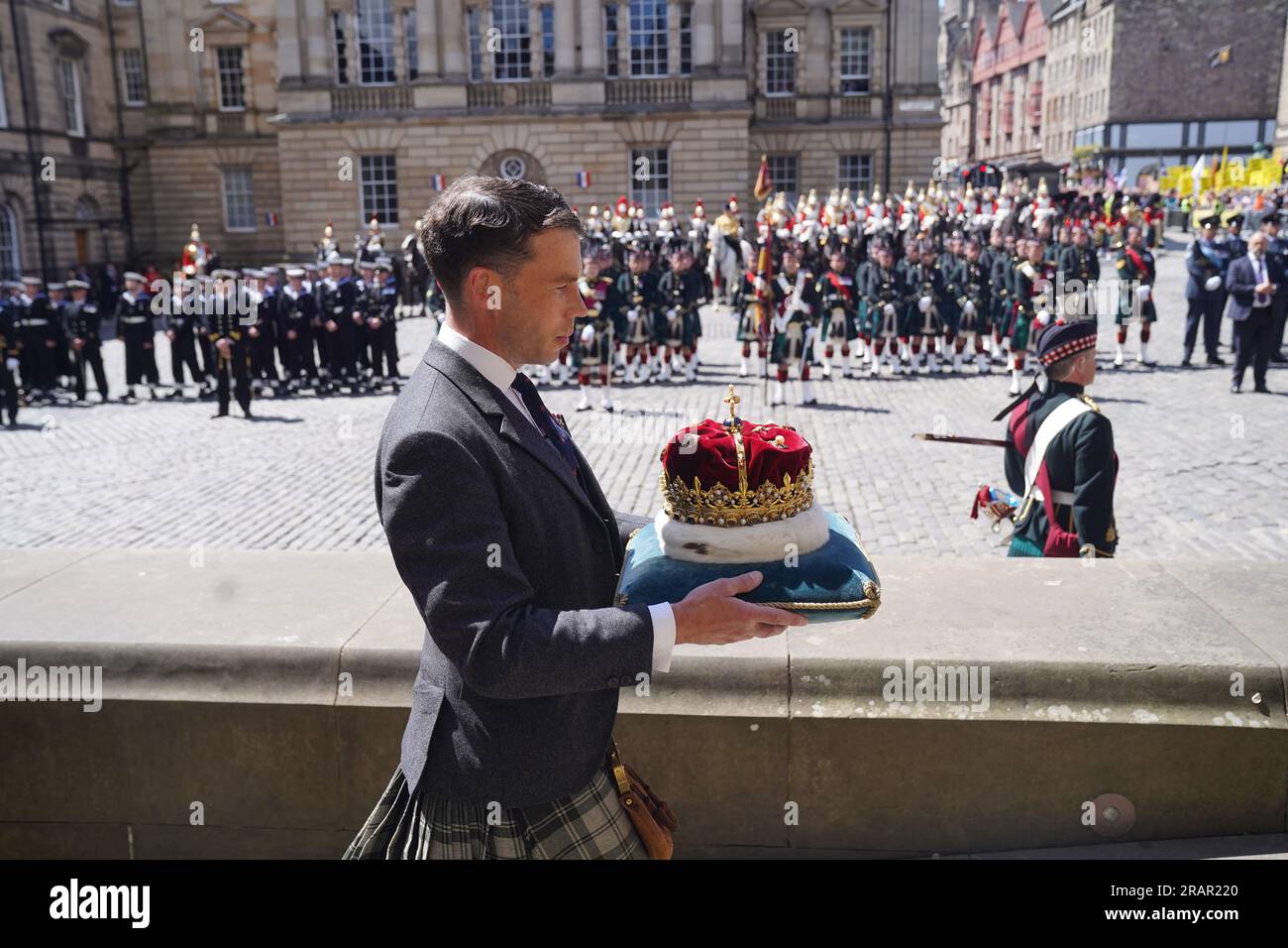The Crown, which forms part of the Honours of Scotland, is carried into