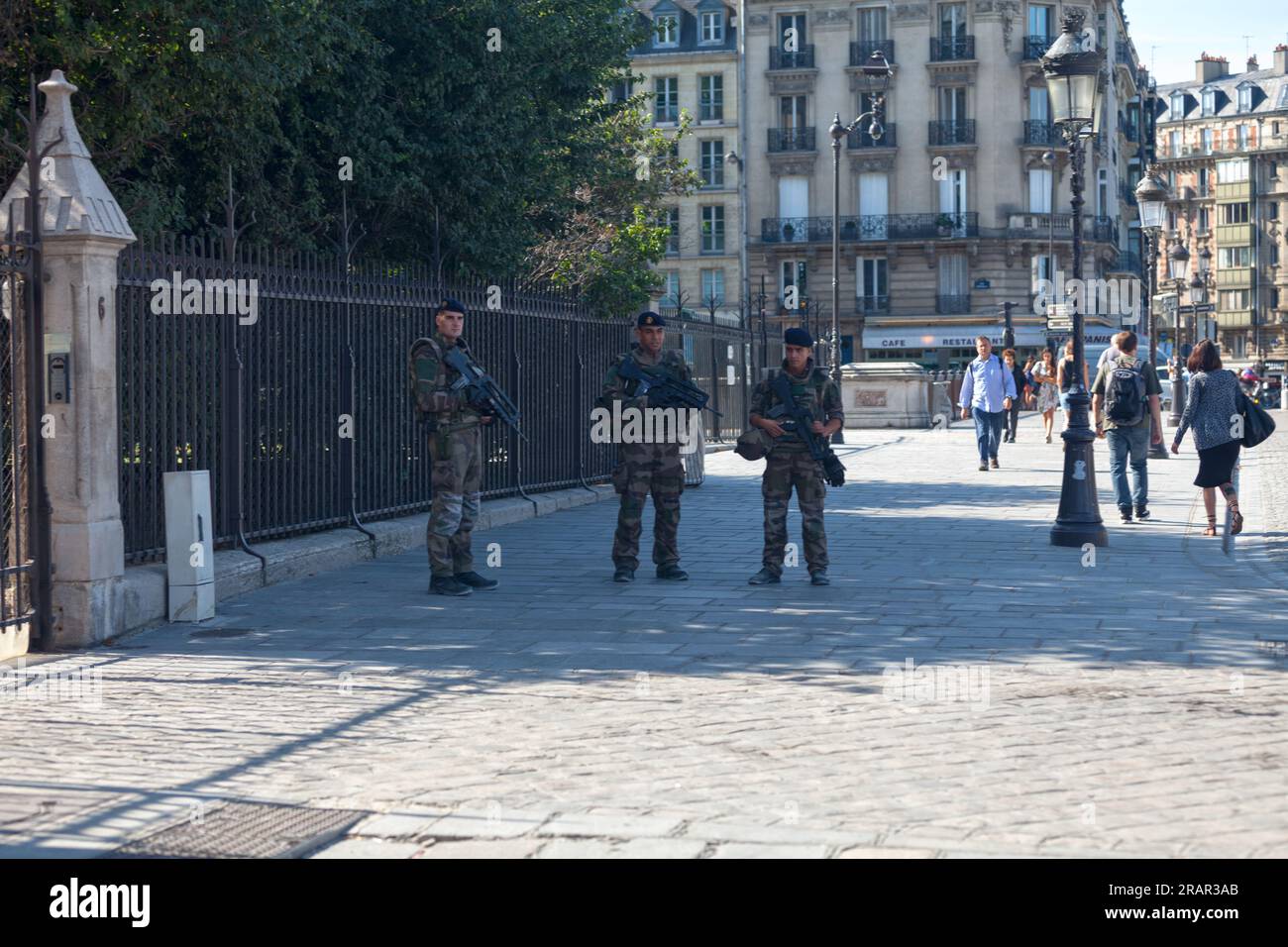 Paris, France - September 01 2016: Group of soldiers patrolling around Notre Dame de Paris to prevent terrorist attack in Paris. Stock Photo