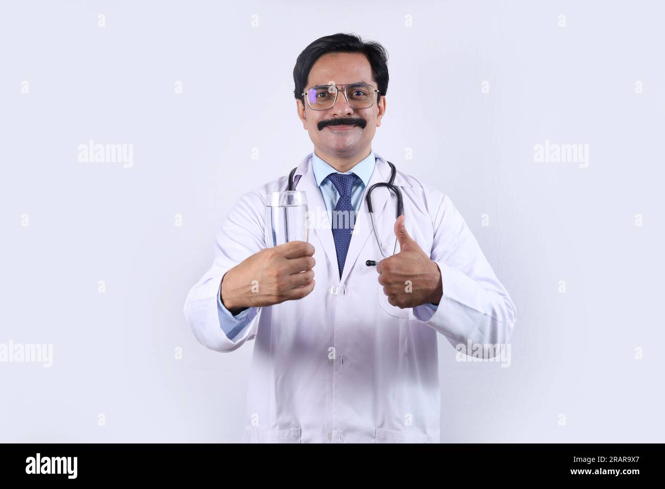 Doctor recommending nutritional diets and drinks for a better health. Stock Photo