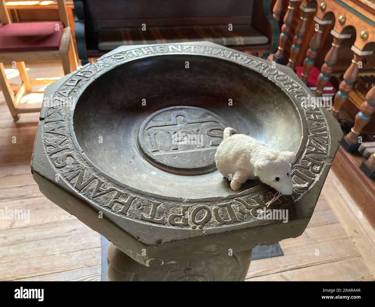 The church in Kopparberg. The unusual baptismal font (designed as a priest) from 1644 to the