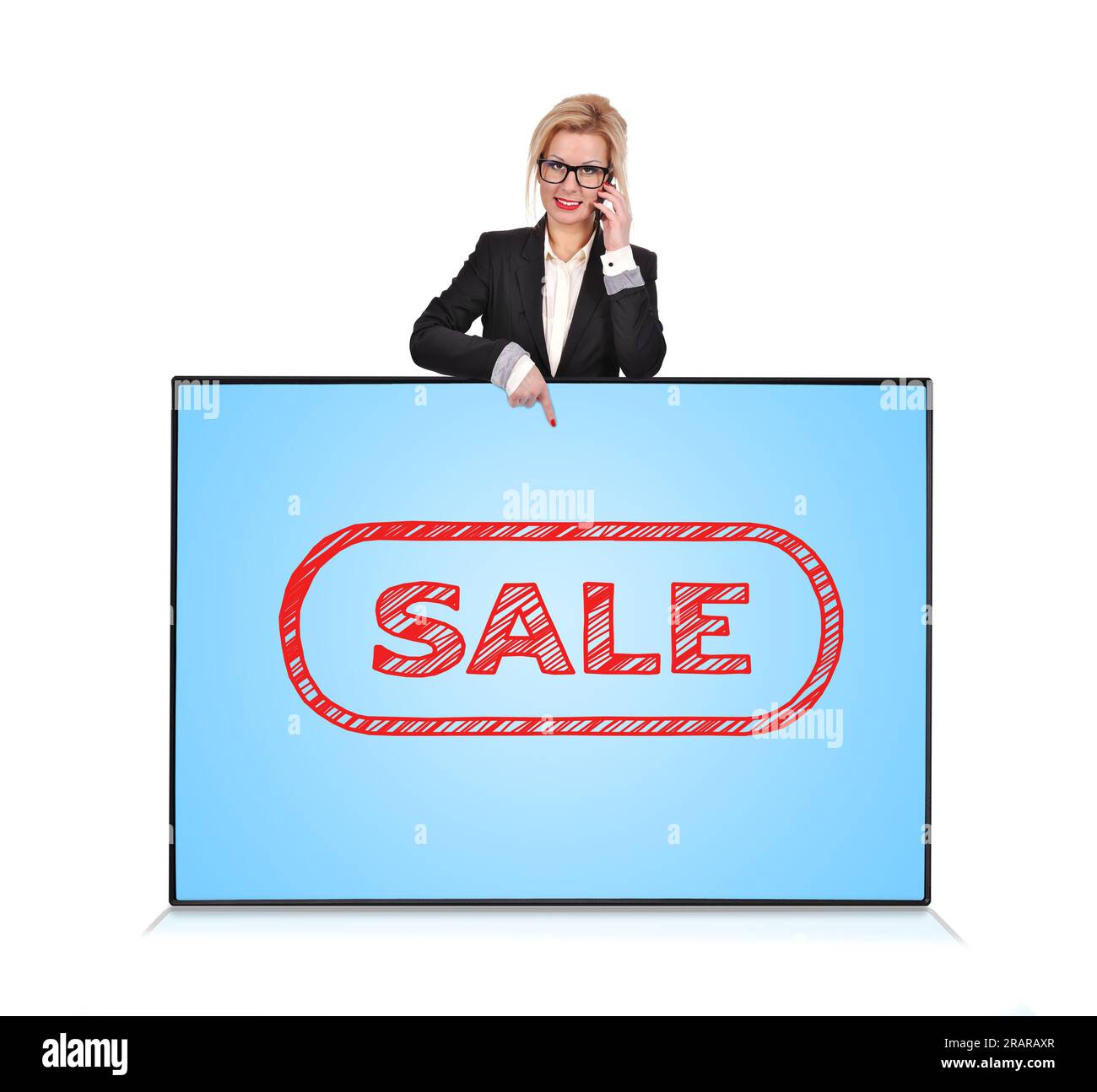 businesswoman with cellphone pointing to plasma panel with sale Stock Photo