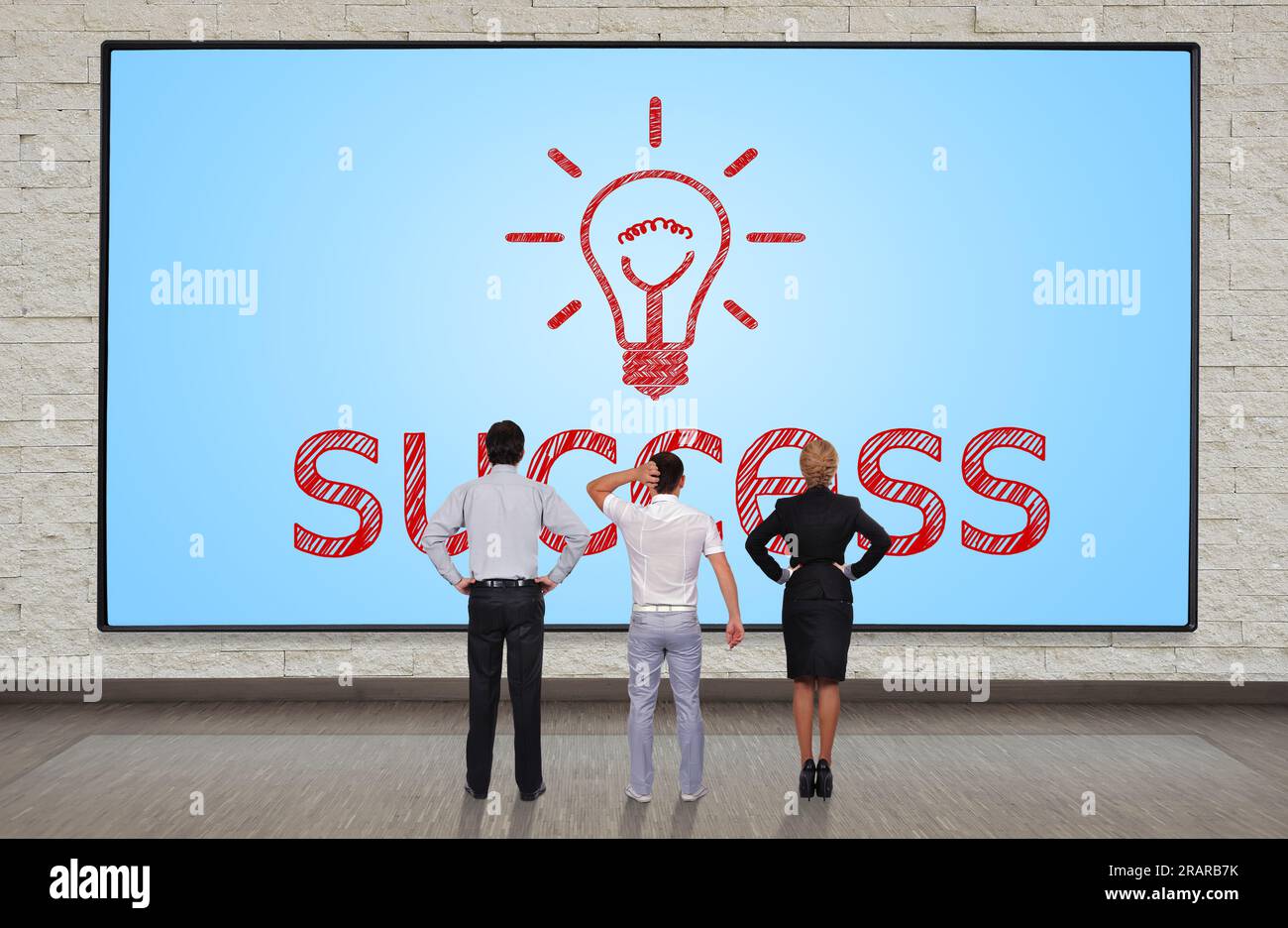 businesspeople looking at big plasma panel with success symbol Stock