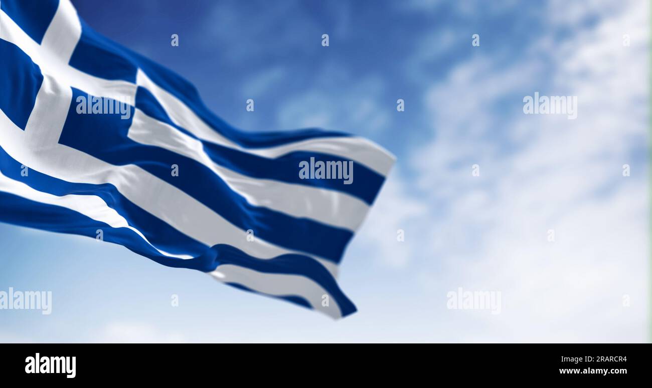 National flag of Greece waving in the wind on a clear day. Blue and white stripes with a blue canton bearing a white cross. 3d illustration render. Fl Stock Photo