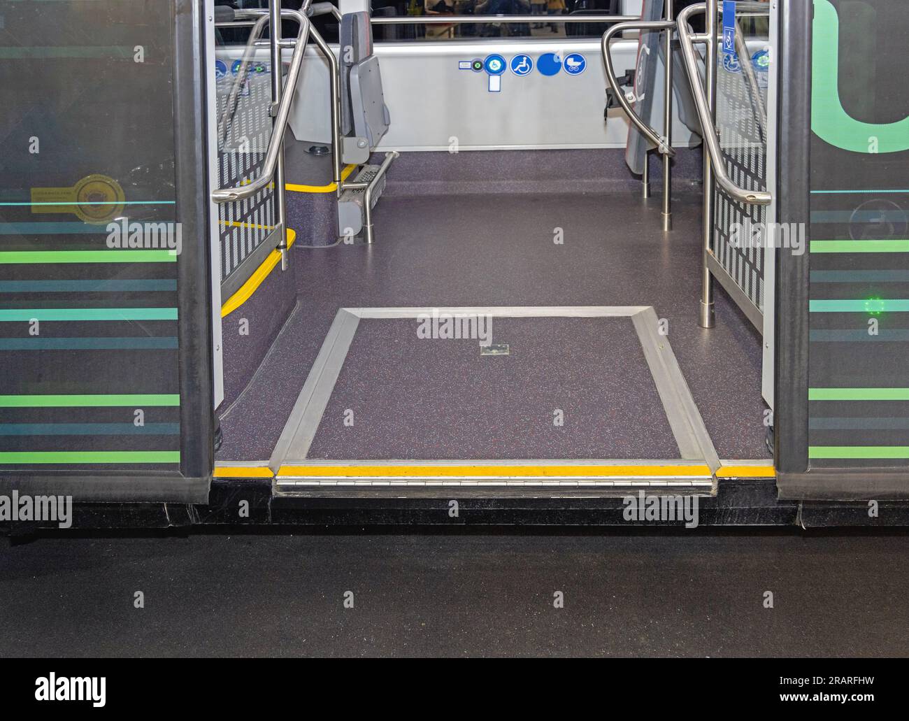 Automated Wheelchair Loading Ramp at Low Floor City Bus Public Transport Stock Photo