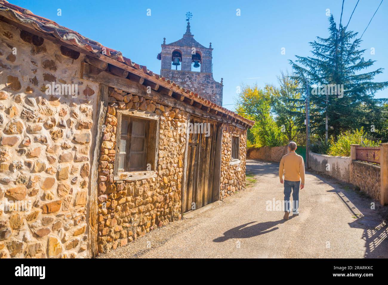 Street and church. Saldaña de Ayllon, Segovia province, Castilla Leon, Spain. Stock Photo