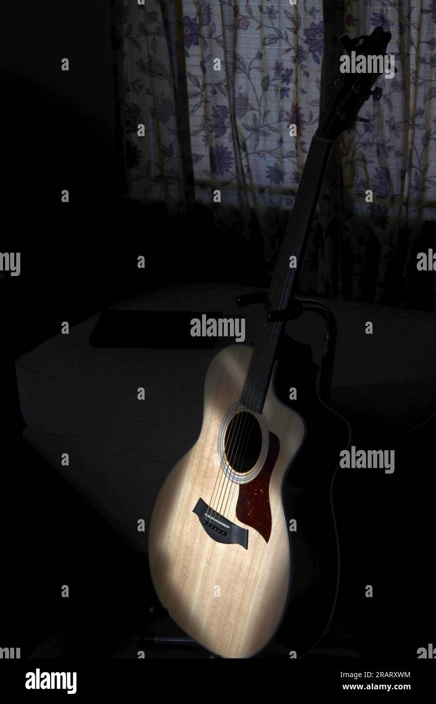 acoustic guitar and sunbeam Stock Photo