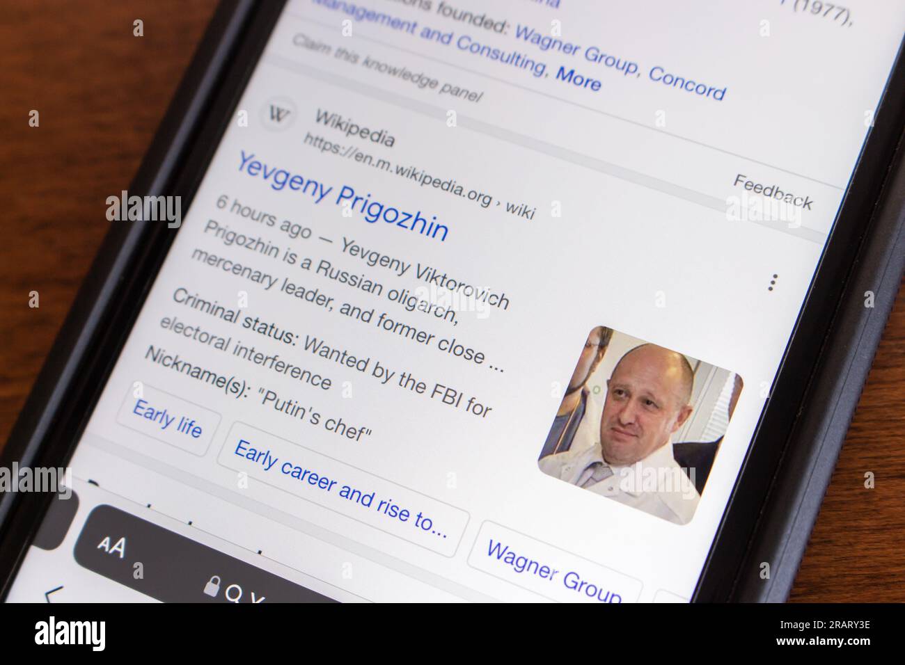 Search result of Yevgeny Prigozhin on Google website seen in an iPhone screen. Yevgeny Viktorovich Prigozhin is a Russian oligarch, mercenary leader Stock Photo