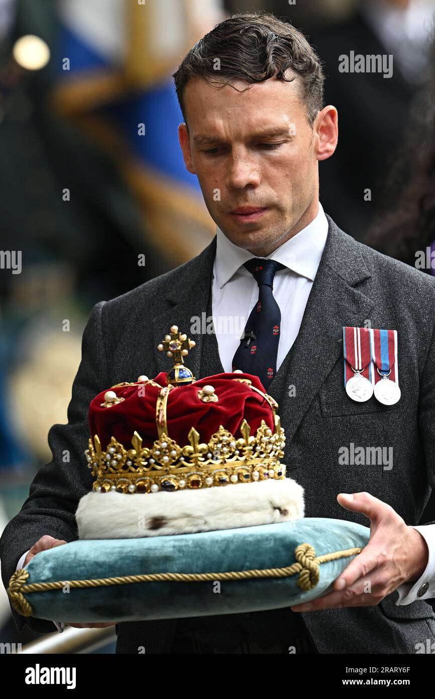 The Duke of Hamilton and Brandon carries the Crown, which forms part of the Honours of Scotland, into St Giles' Cathedral ahead of the the National Service of Thanksgiving and Dedication for King Charles III and Queen Camilla, and the presentation of the Honours of Scotland. Picture date: Wednesday July 5, 2023. Stock Photo