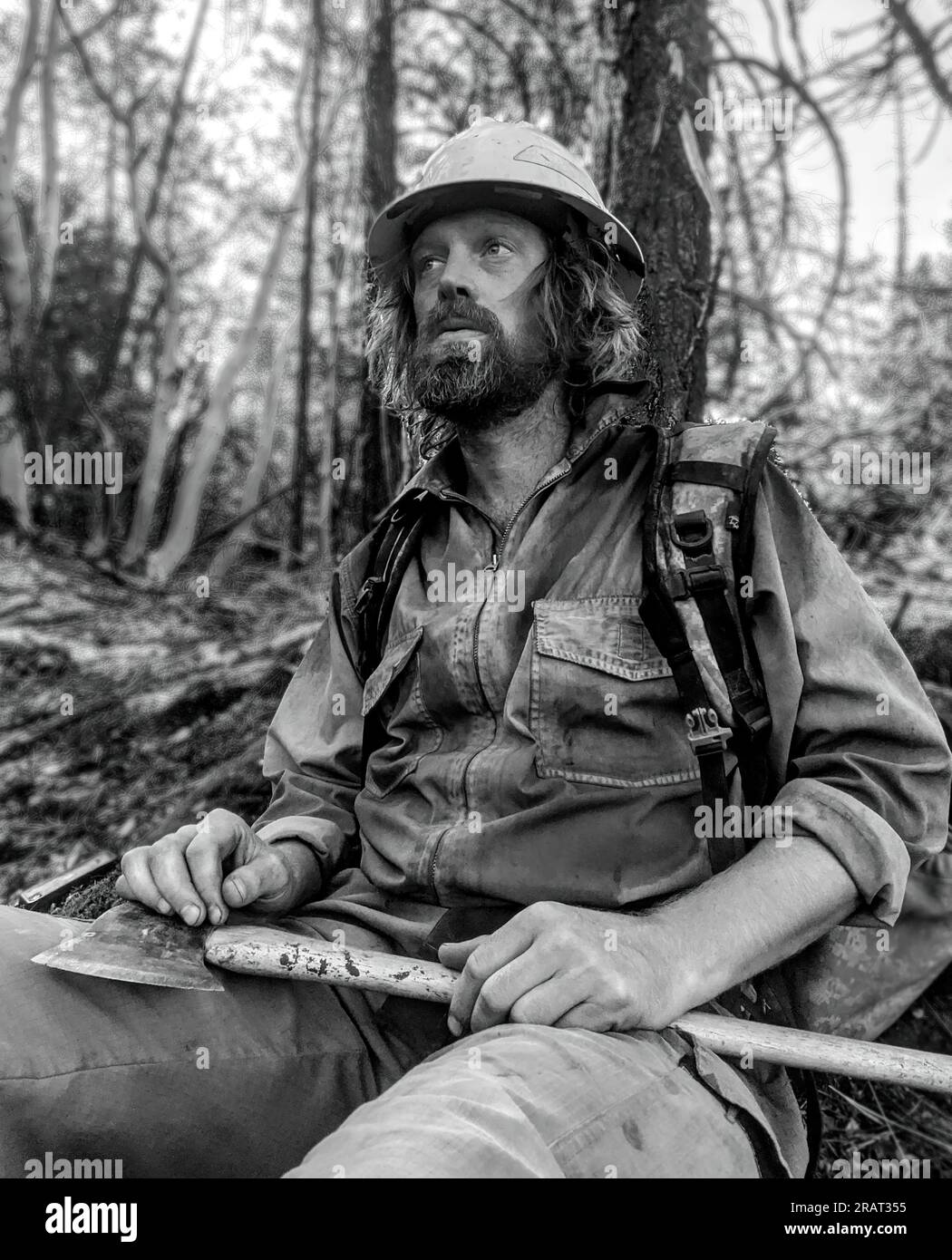 A BLM firefighter stops to rest while working on the 2022 McKinney Fire near Yreka, California. Photo by C Steenhoven, BLM Stock Photo