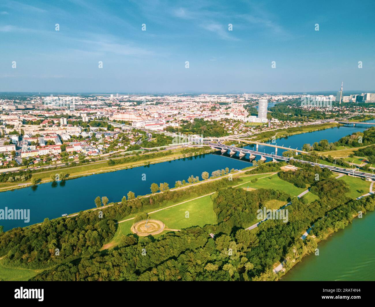 Aerial drone view of Danube river in Vienna Austria cityscape with danube island Stock Photo
