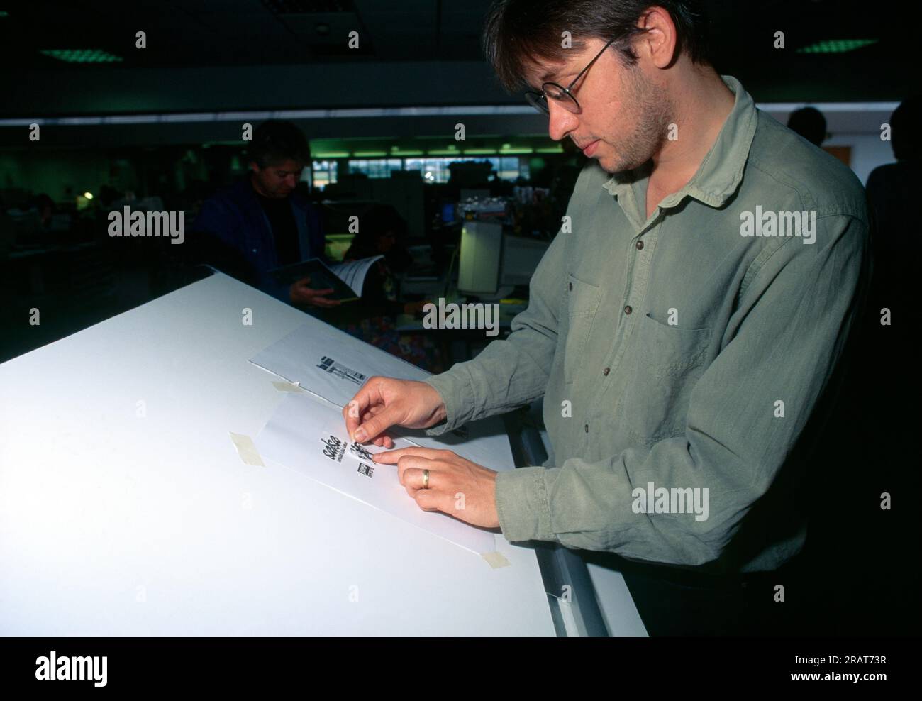 express-echo-newspaper-designer-using-cut-and-paste-technique-stock