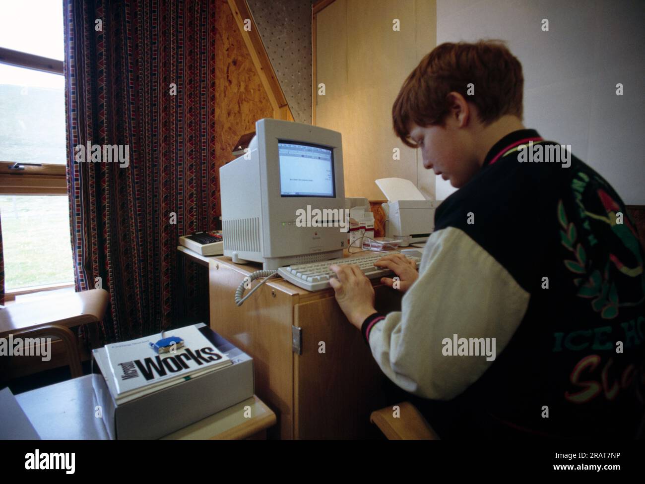 Foula Shetlands Scotland School Boy Using personal Computer Apple Macintosh (1980's) Stock Photo