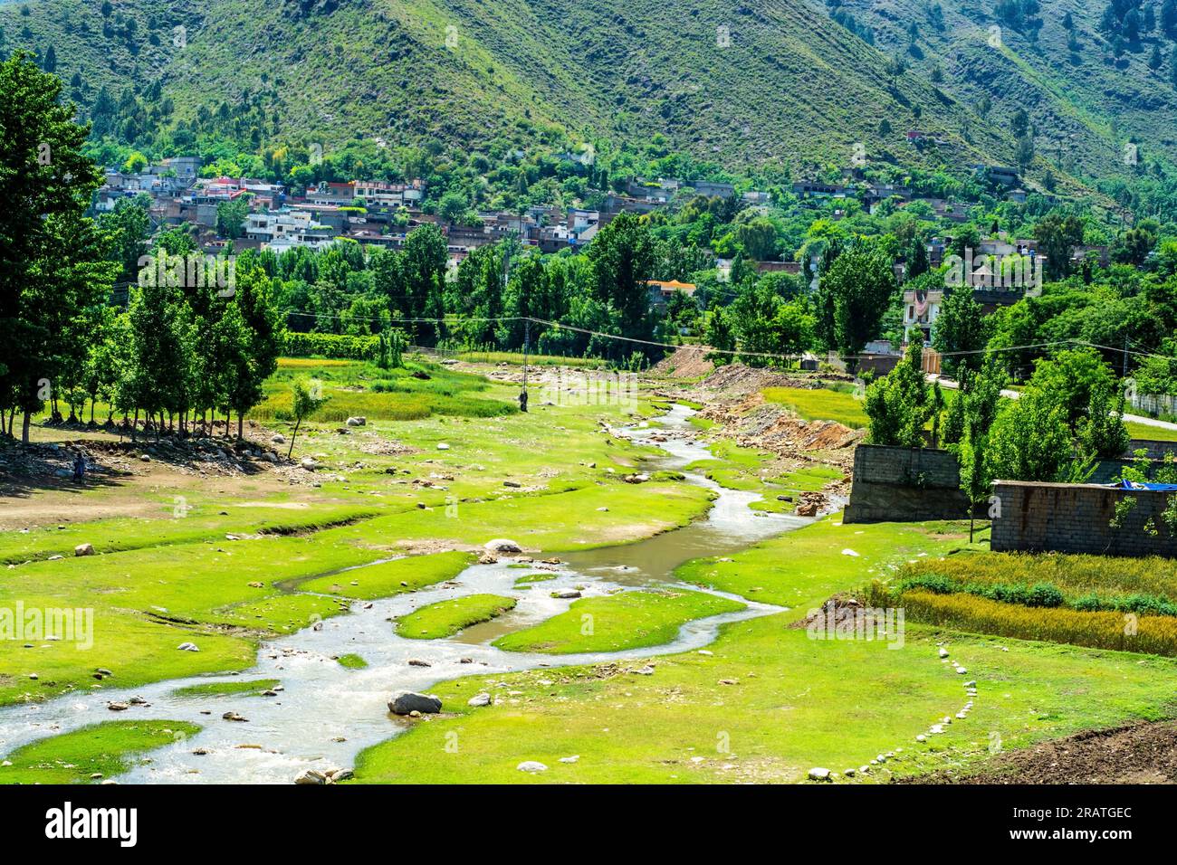 River in the lush green Kashmir Valley Stock Photo