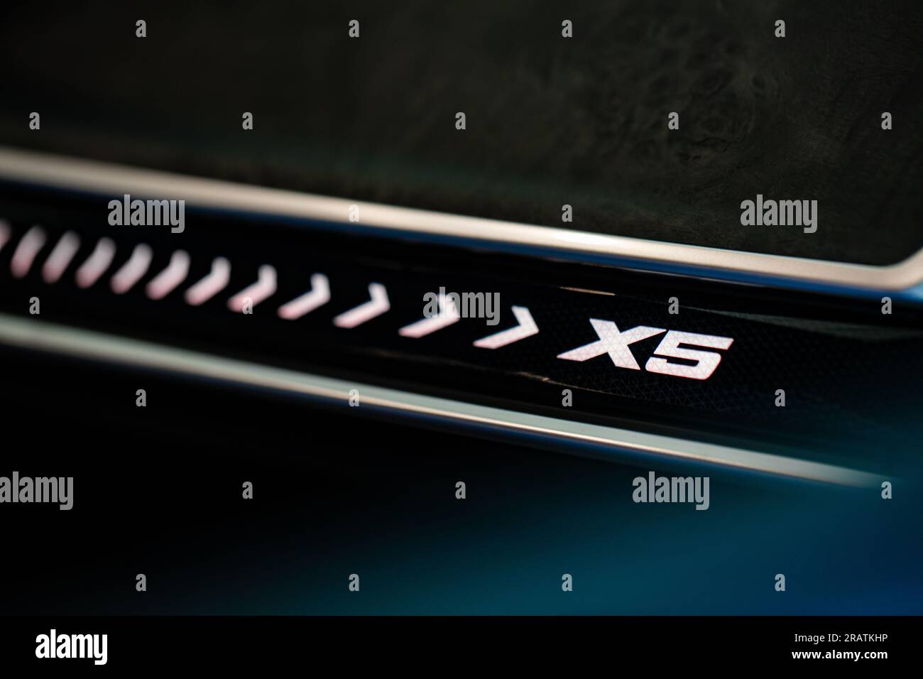 Lviv, Ukraine July 3, 2023 Closeup of BMW X5 G05 illuminated ambient