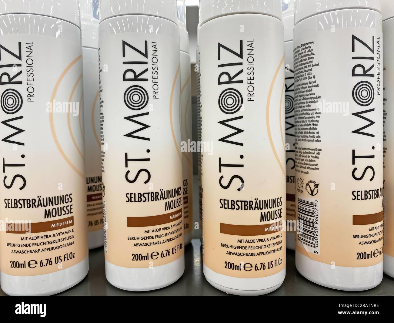Viersen, Germany - July 4. 2023: Closeup of bottles St. Moriz self tanning mousse in shelf of german supermarket Stock Photo
