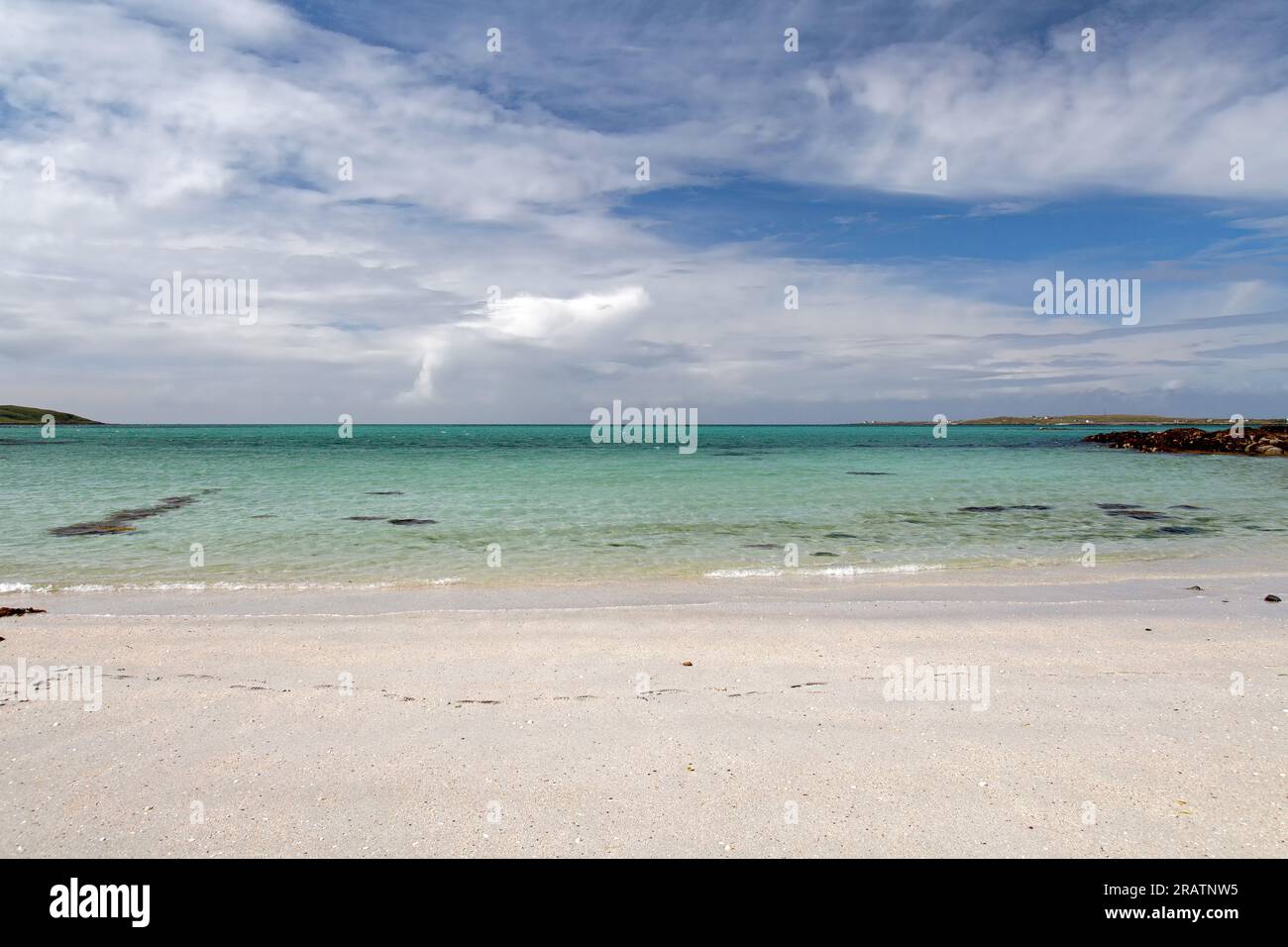 White Sand and Turquoise Sea at Rubh' an t-Seana Bhalla Beach or Rubha Ban beach, Rubha Ban, Eriskay, Outer Hebrides, Scotland, United Kingdom Stock Photo