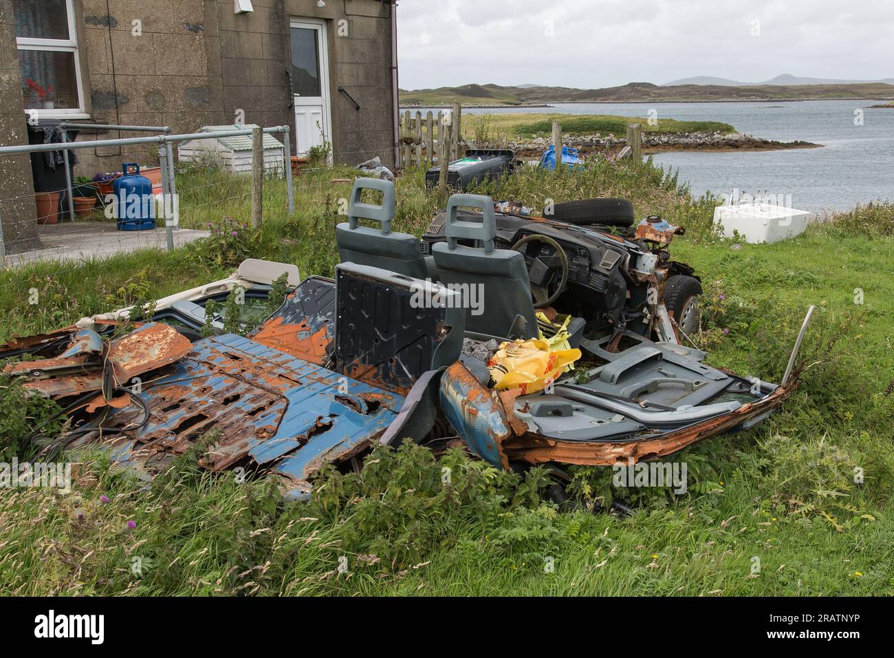 Old wrecked covered car hi-res stock photography and images - Alamy