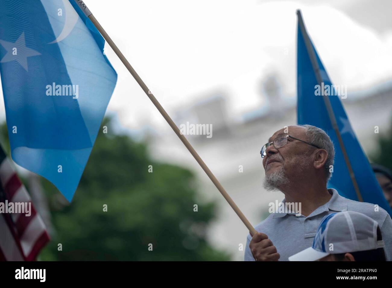 Washington, United States. 05th July, 2023. A group of Uyghur demonstrators gather to commemorate the anniversary of the massacres in Urumqui, China, which took place on July 5, 2009 between the Uyghur and Han Chinese, outside the White House in Washington, DC on Wednesday, July 5, 2023. Groups around the world have called for China to end continued violence against Uyghur and other ethnic Muslims. Photo by Bonnie Cash/UPI Credit: UPI/Alamy Live News Stock Photo