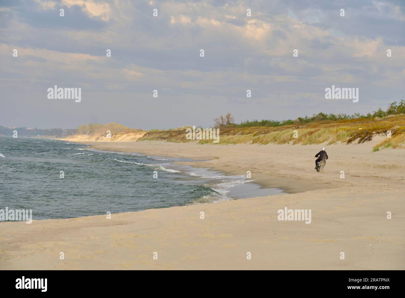Beach Rode Side Profile Sandy beach bike ride hi-res stock photography and images - Alamy