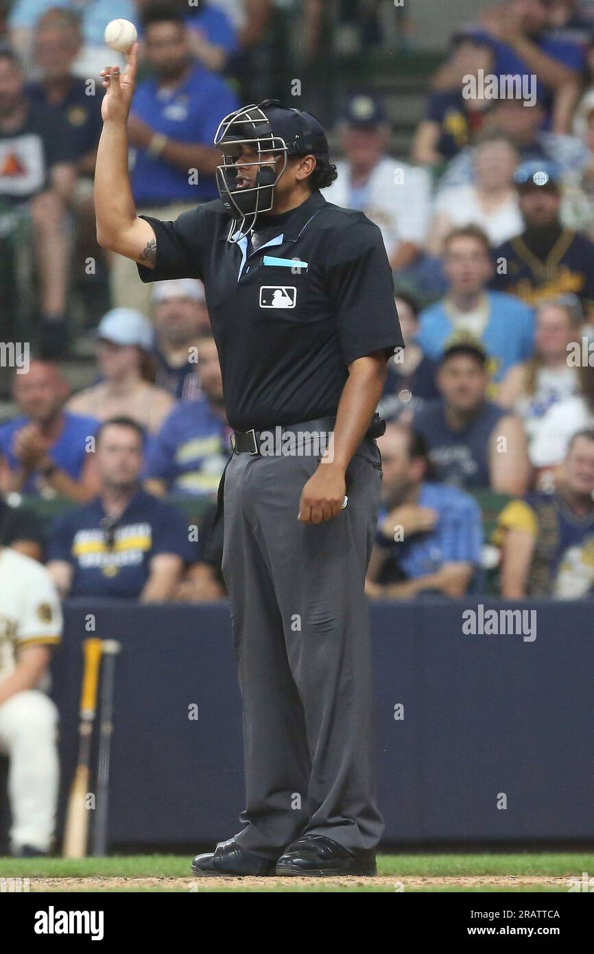 Major League umpire Erich Bacchus looks on during the game between