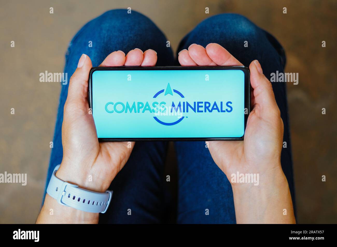 In this photo illustration, the Compass Minerals International logo is