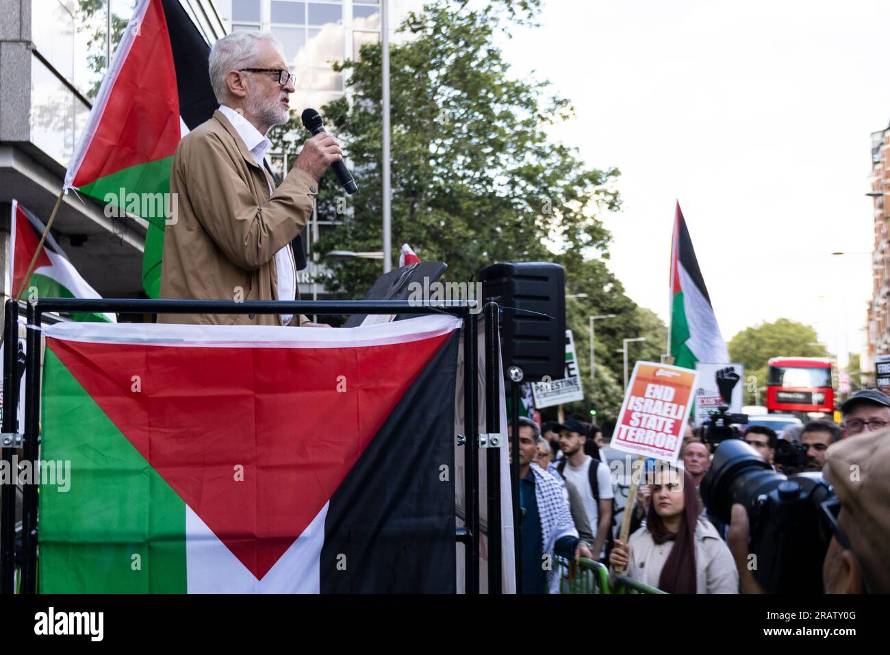 London, UK. 05th July, 2023. Jeremy Corbyn stood strong for Palestinian human rights today, delivering a moving speech that resonated amongst a diverse crowd. Hundreds of demonstrators, including members of various Jewish groups, convened outside the Israeli Embassy in London. Unifying under a single cause, they expressed a fervent outcry against the alleged genocide by the Israeli government in Jenin. Today, the voice of protest rang loud in the heart of Britain. Credit: Sinai Noor/Alamy Live News Stock Photo