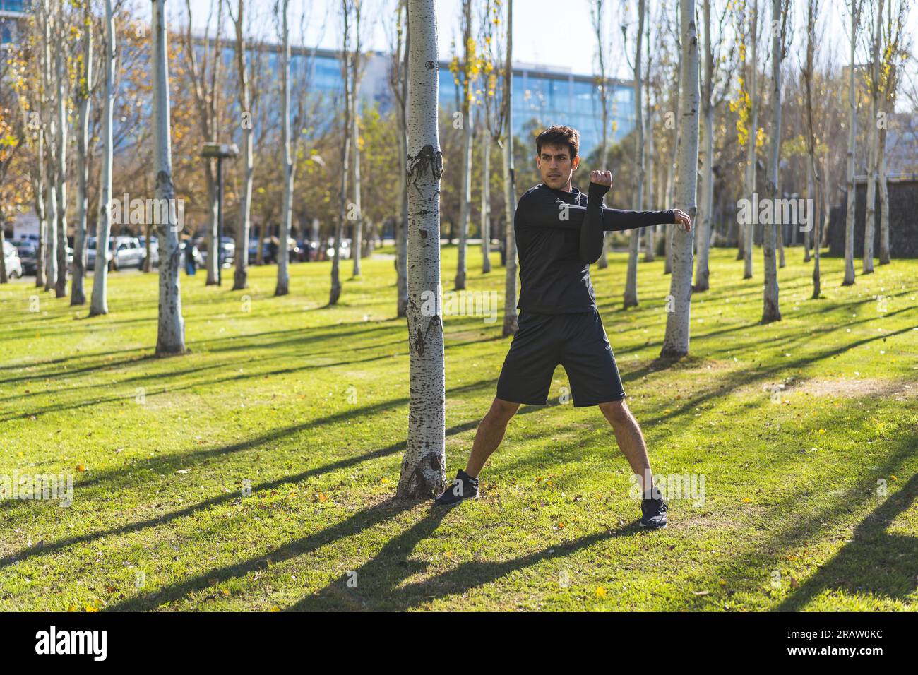 Man stretching arms hi-res stock photography and images - Alamy