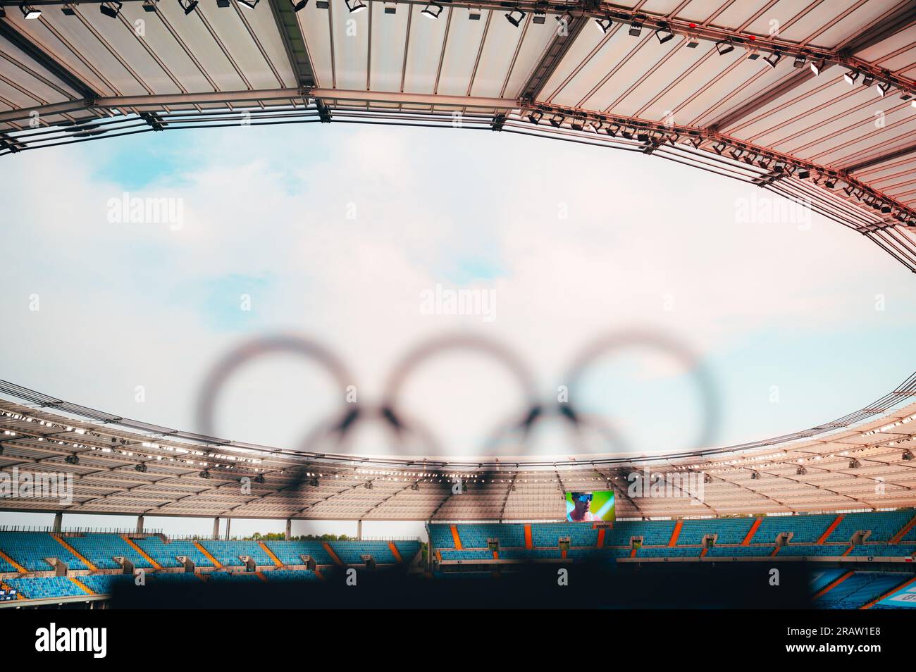 PARIS, FRANCE, JULY 7, 2023 Silhouette of Olympic Rings Embracing a