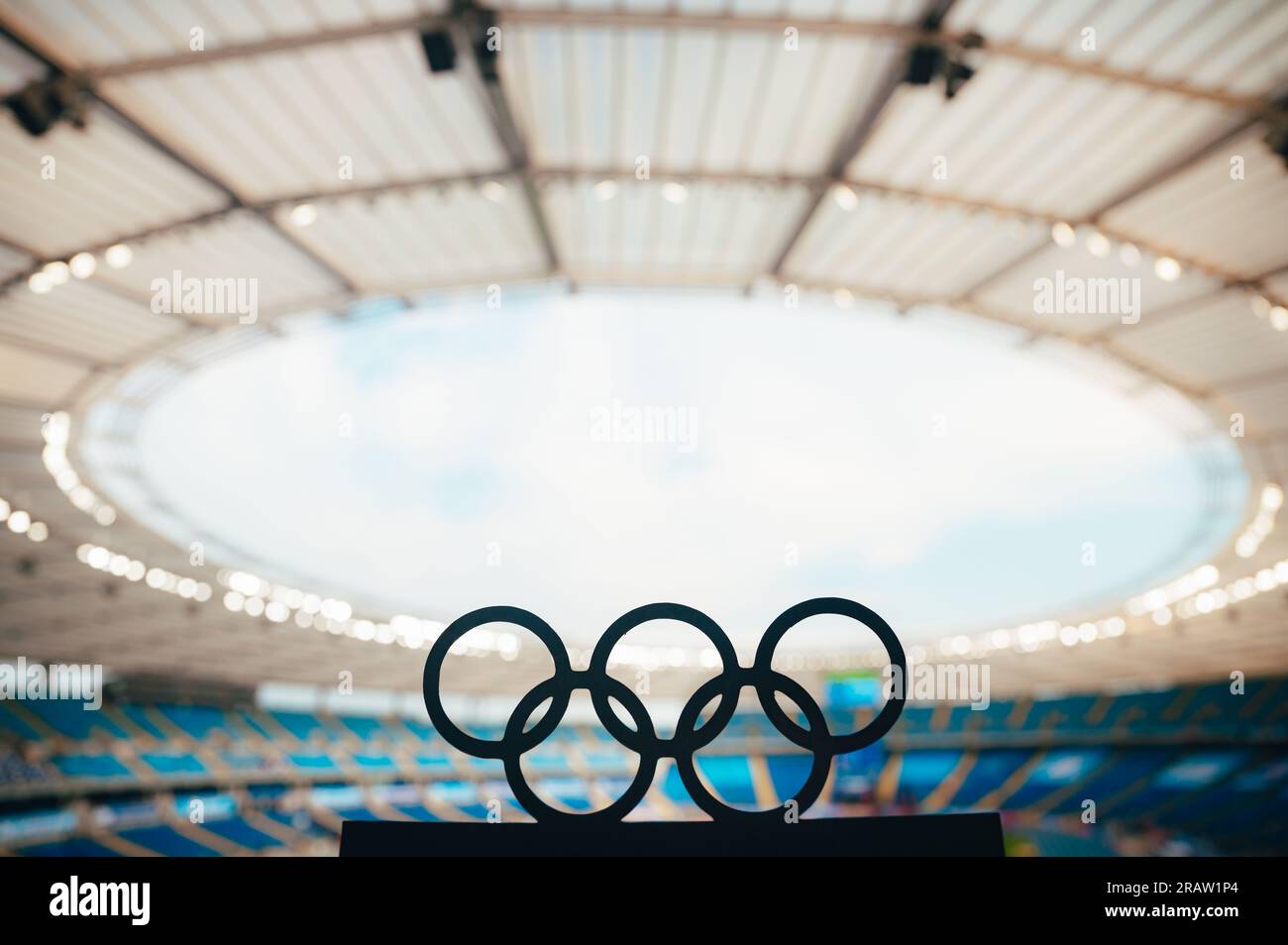 PARIS, FRANCE, JULY 7, 2023 Silhouette of Olympic Rings Reflecting on