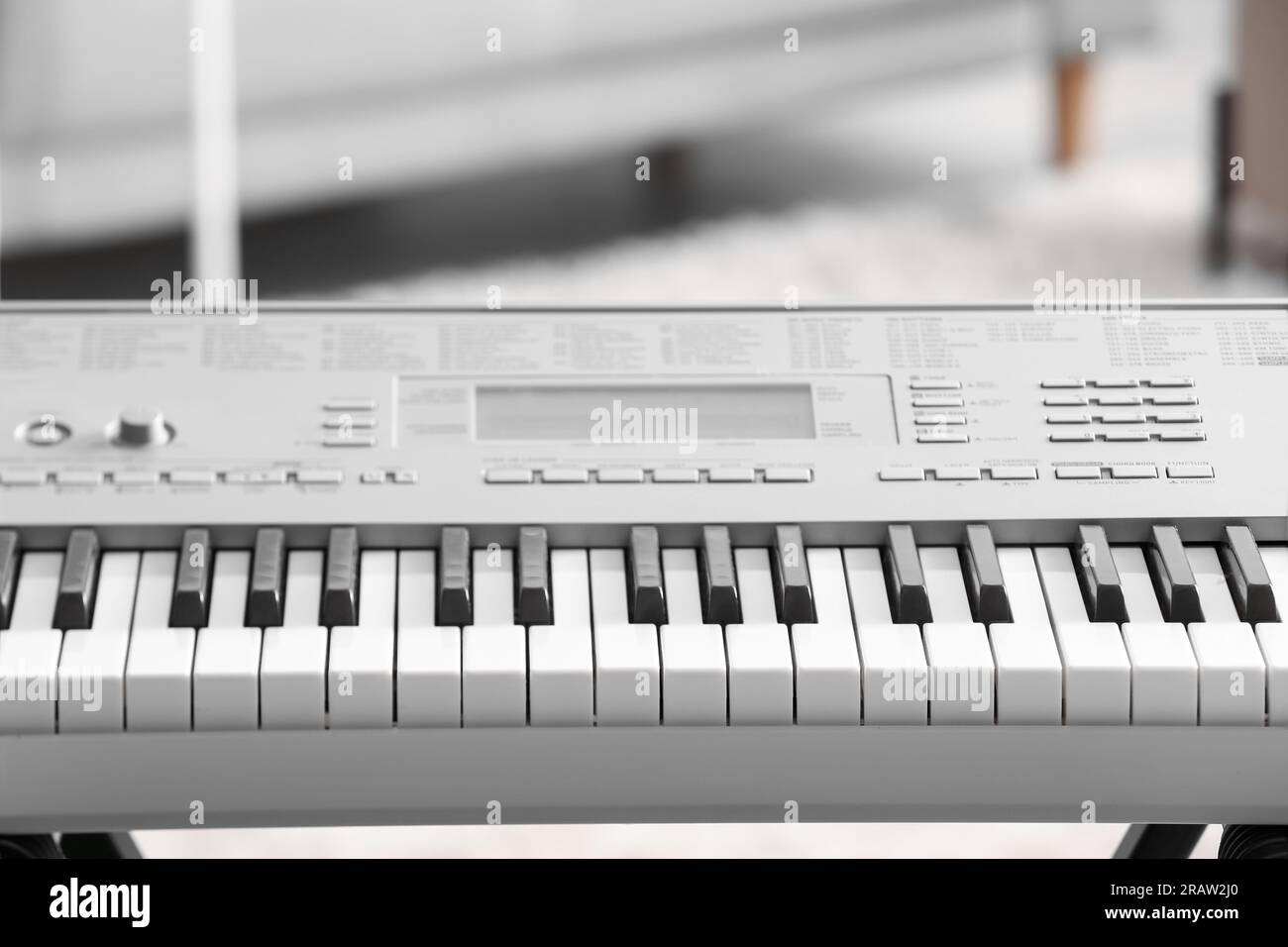 Modern synthesizer in room, closeup Stock Photo