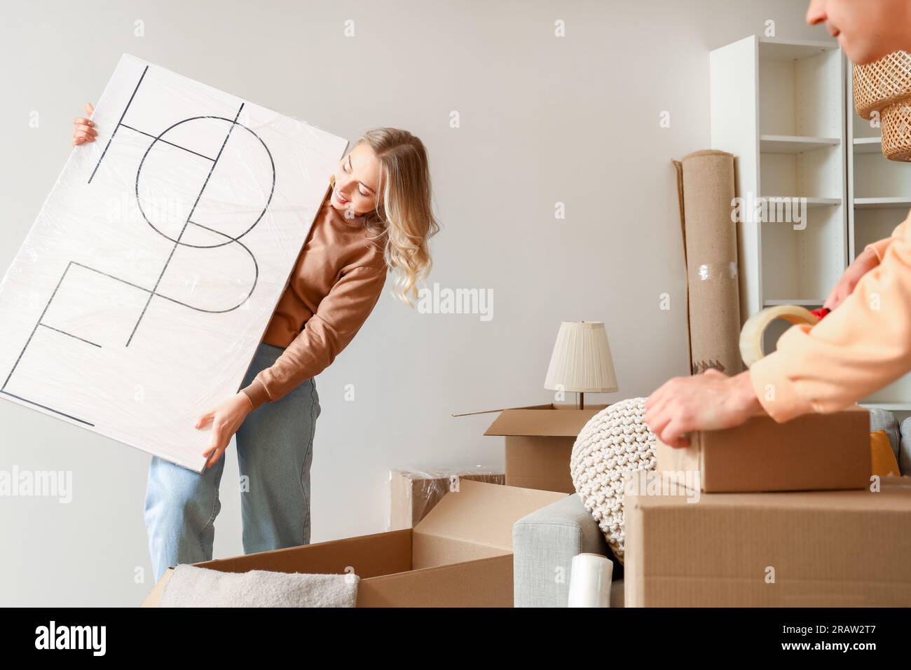 Person packing painting real hi-res stock photography and images - Alamy