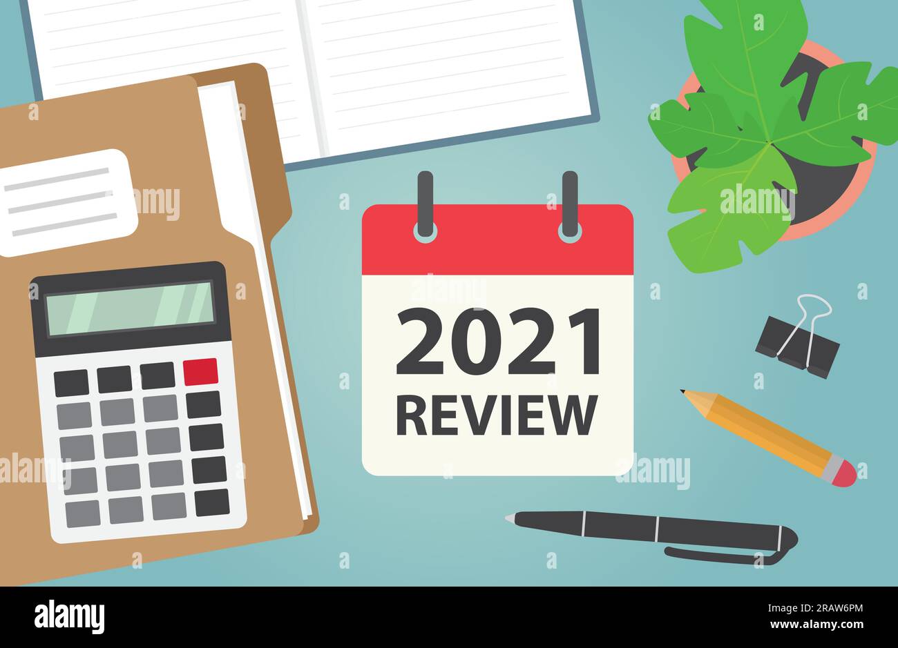 2021 review written in calendar on office desk, flat lay composition ...