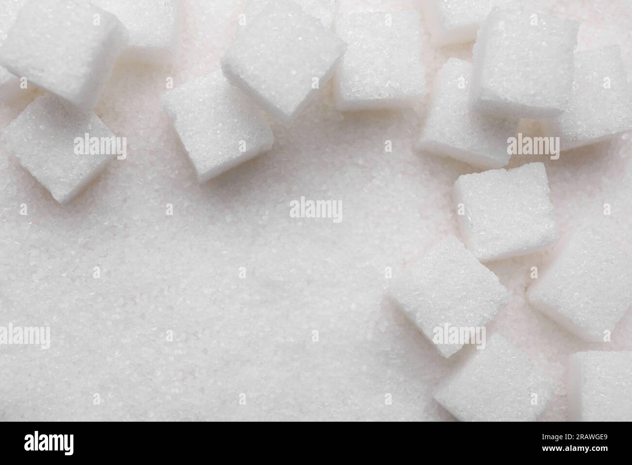 Different types of white sugar as background, top view Stock Photo - Alamy