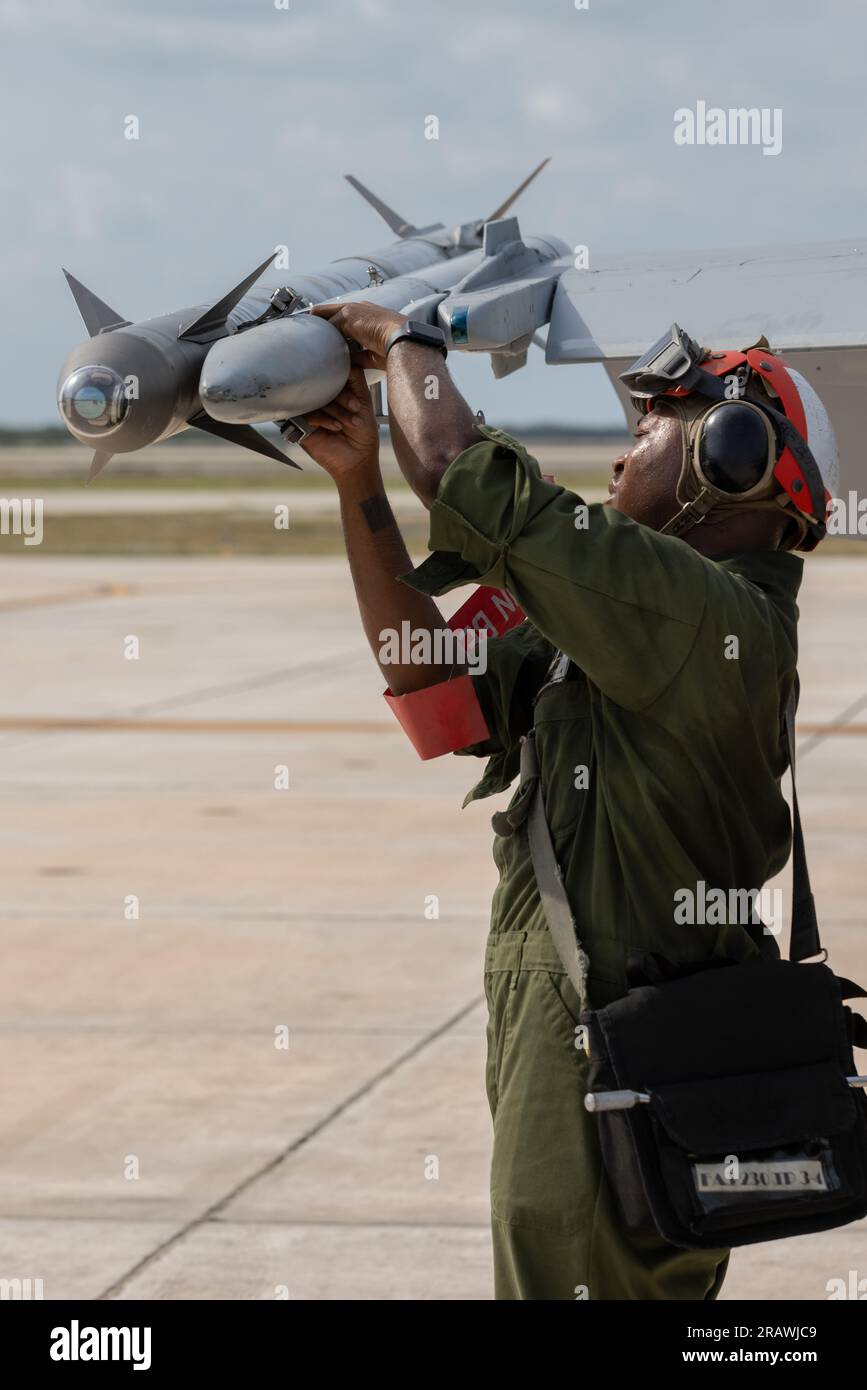 A U.S. Marine Corps aviation ordnance system technician with Marine All ...