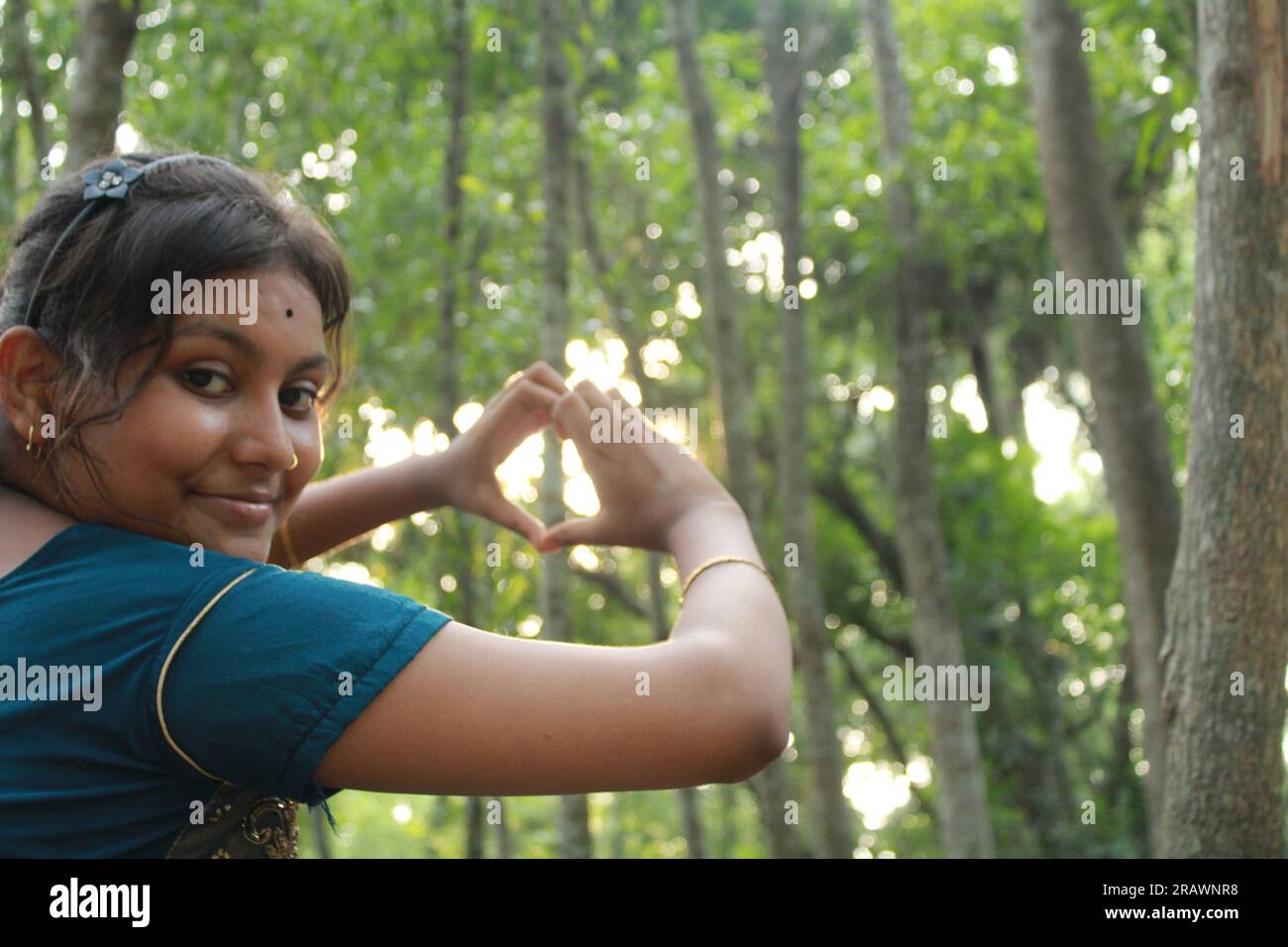 Portrait of young Beautiful Indian Girl outdoors Stock Photo - Alamy