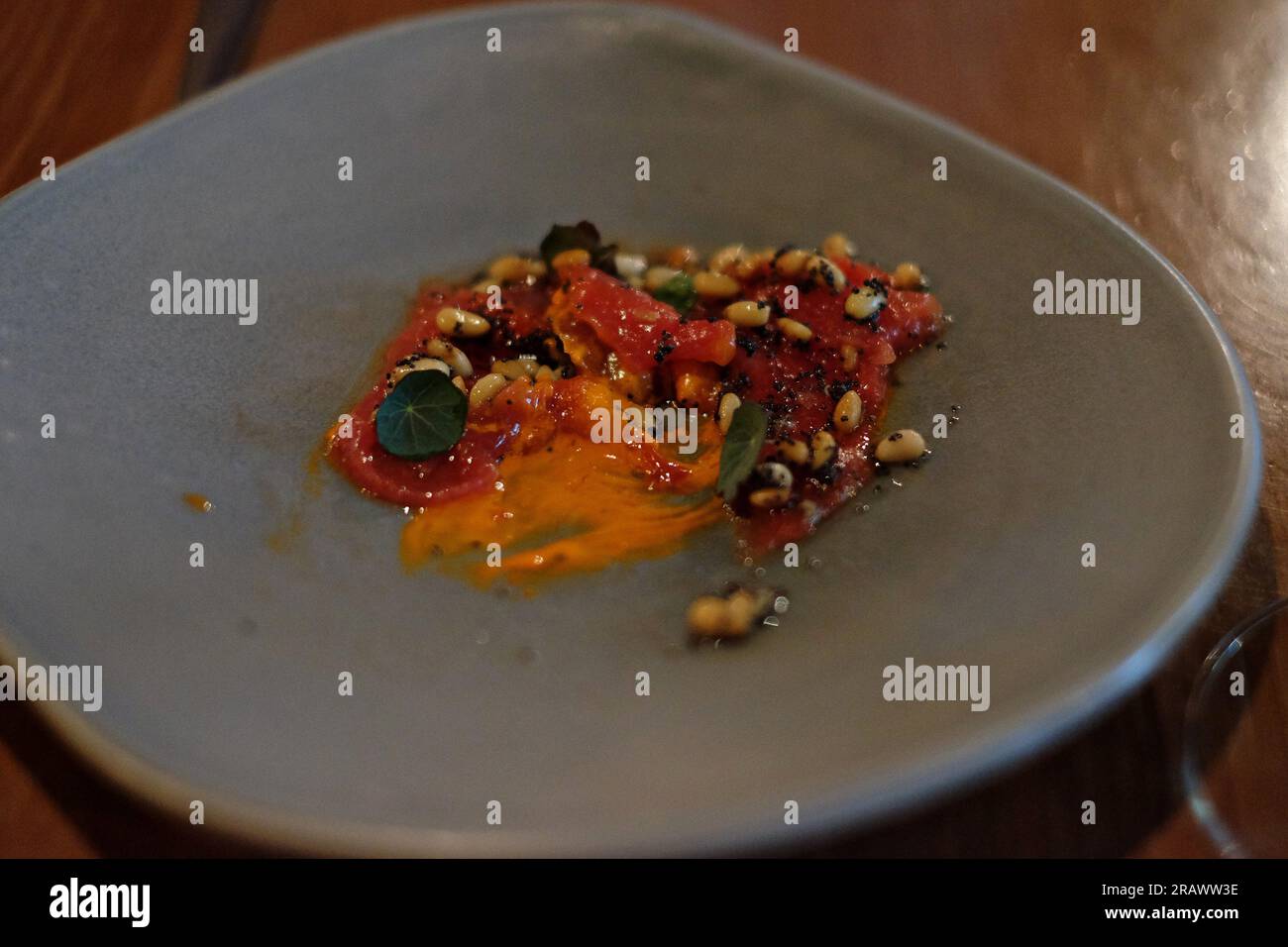 Gourmet food, Watermelon with Capsicum and Pine Nuts fixed menu lunch At Yellow Vegan Restaurant In Potts Point, Sydney Stock Photo