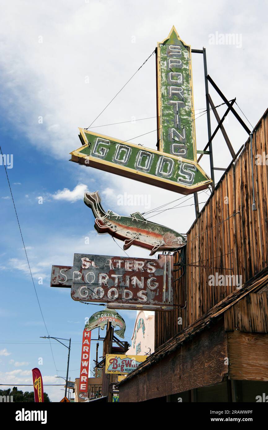 Vintage roadside signs for a sporting goods store selling fishing supplies on scenic Route 395 as it passes through Lone Pine, California Stock Photo