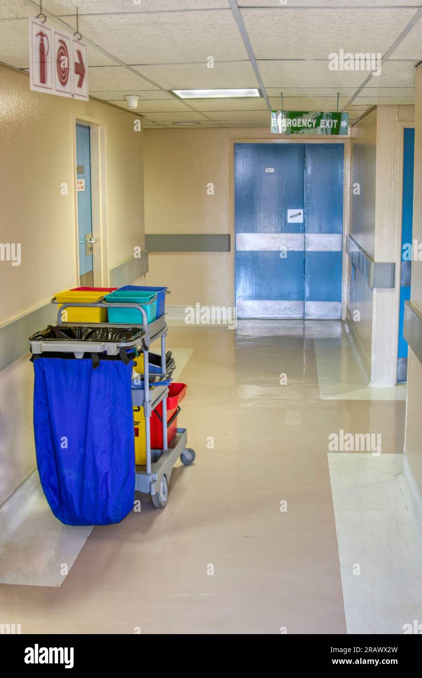 cleaning cart on a spotless hallway, in a medical facility, hygiene services Stock Photo