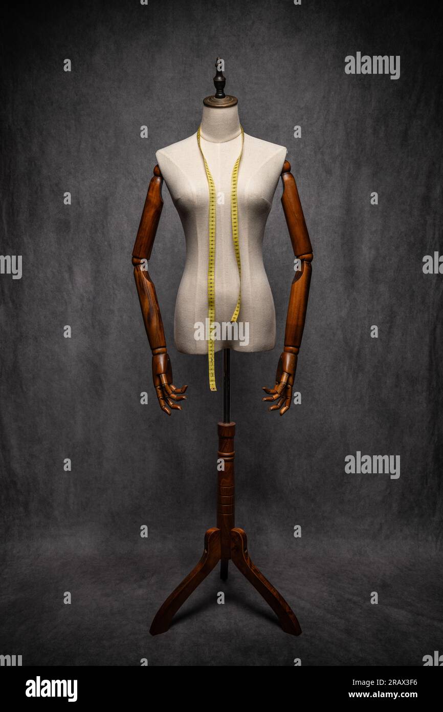 Wooden female dressmakers mannequin, retro style with arms and adjustable  stand Stock Photo - Alamy, image size:866x1390