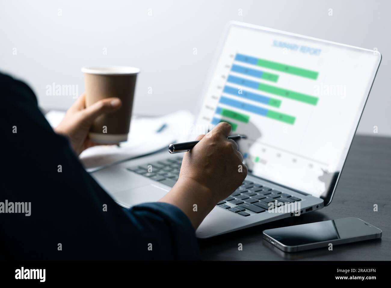 Business Data Analysis on Laptop: Financial Charts, Graphs, Reports for Successful Planning and Strategy. Professional Workplace: Analyzing Business D Stock Photo