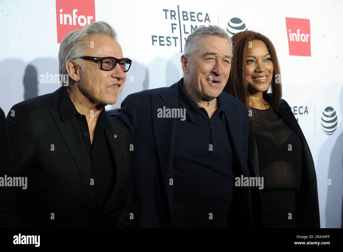 NEW YORK, NY - APRIL 21: Harvey Keitel, Robert De Niro, Grace Hightower attends the 'Taxi Driver' 40th Anniversary Celebration during the 2016 Tribeca Film Festival at The Beacon Theatre on April 21, 2016 in New York City.    People:  Harvey Keitel, Robert De Niro, Grace Hightower Stock Photo