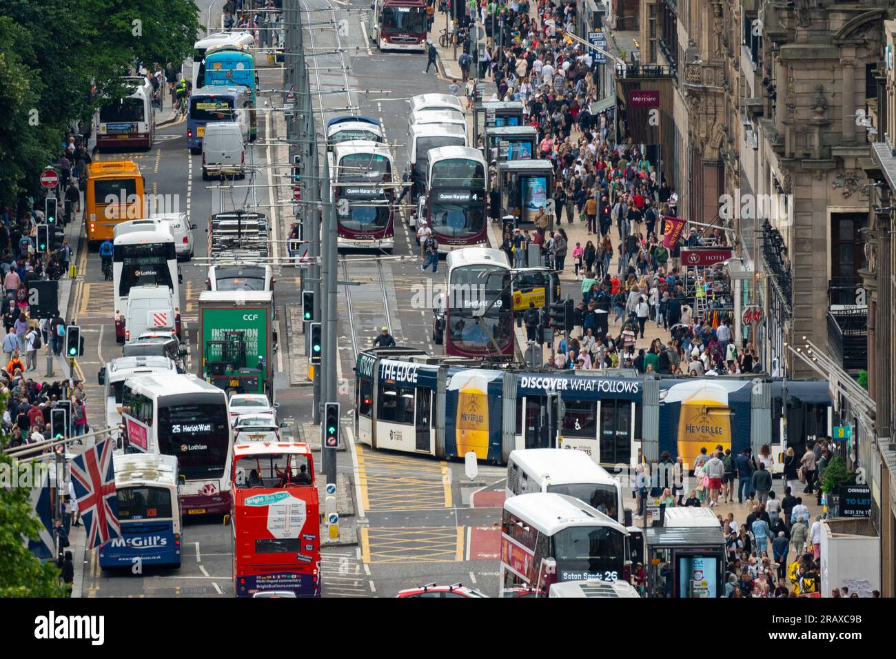 Heavy public transport traffic and pedestrians on Princes Street in Edinburgh, Scotland, UK Stock Photo