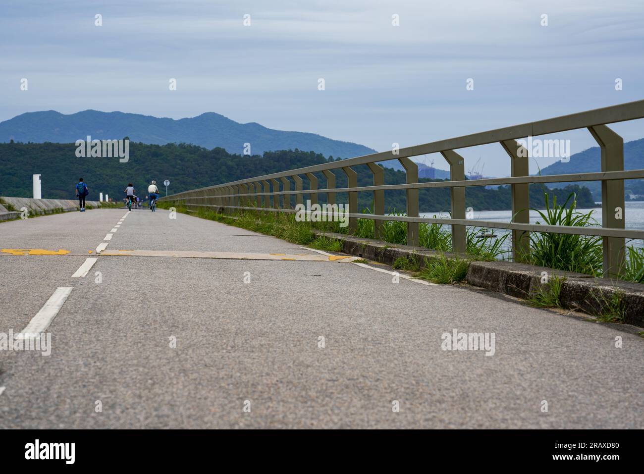 The road and style of Plover Cove Reservoir Dam in Hong Kong Stock