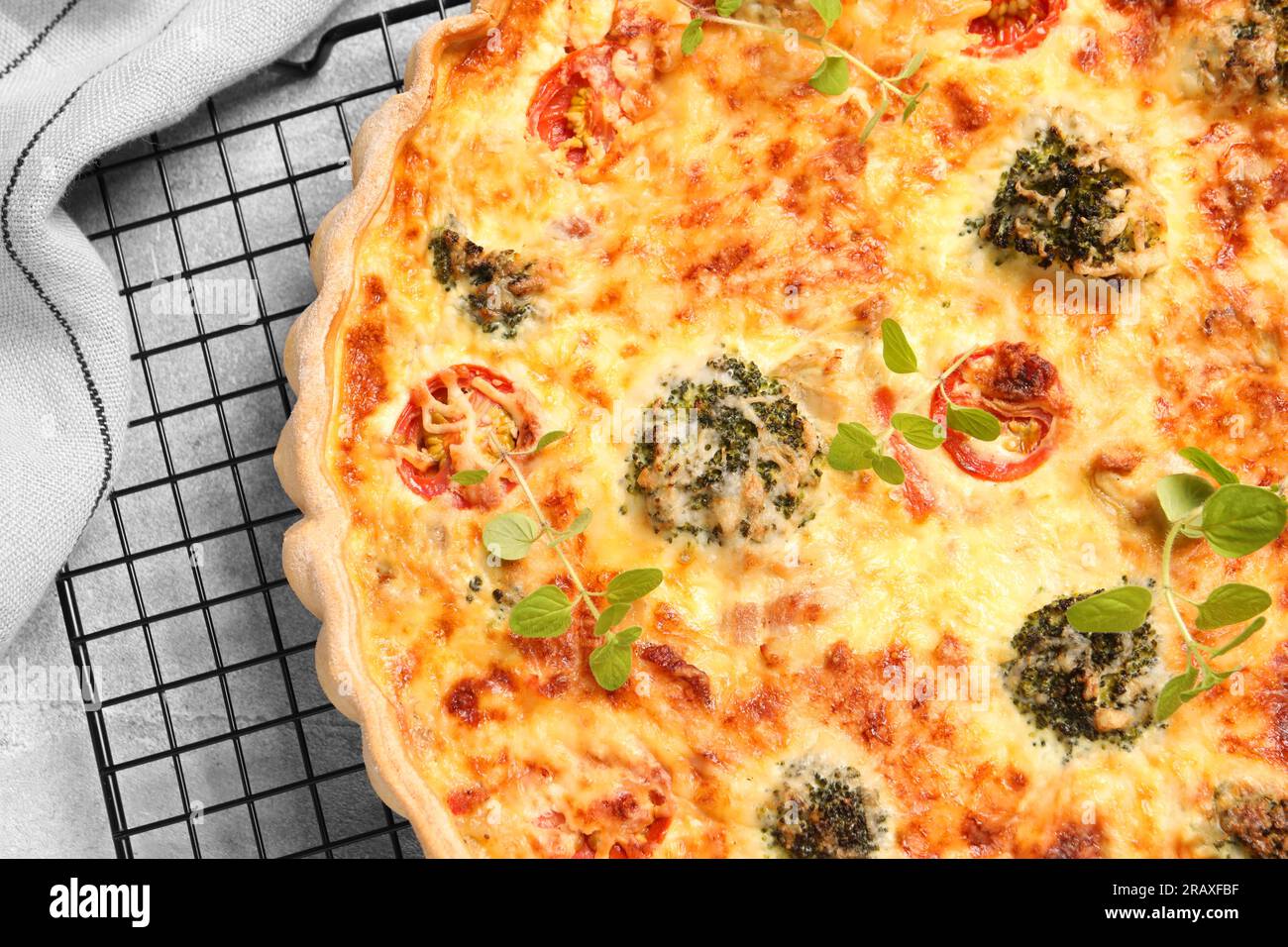 Delicious homemade quiche on table, top view Stock Photo