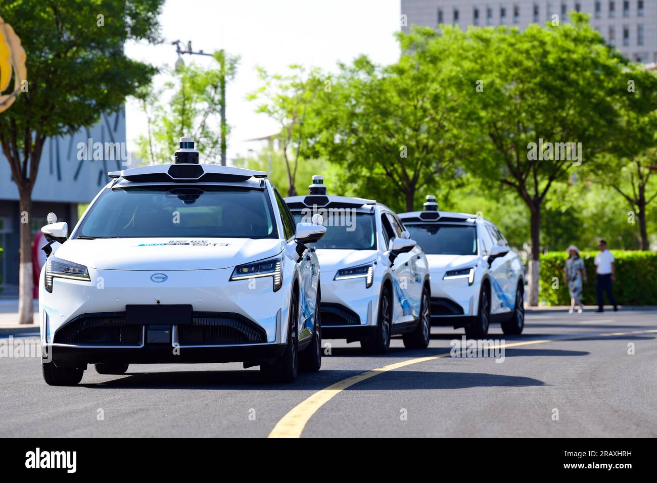 ORDOS, CHINA - JULY 6, 2023 - Self-driving taxis are tested on a street in Ordos, Inner Mongolia, China, July 6, 2023. In recent years, Ordos City Kan Stock Photo