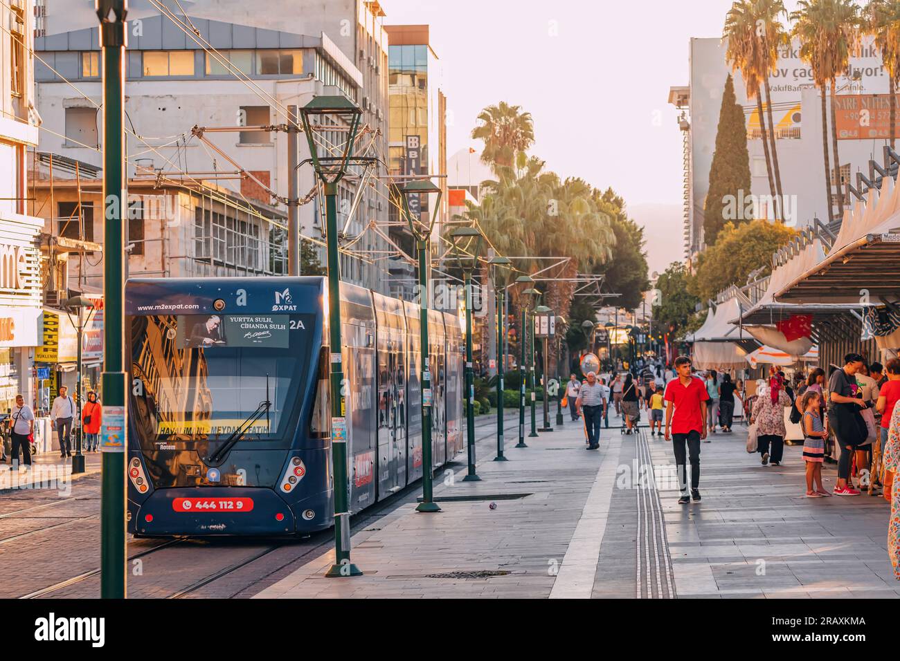 25 September 2022, Antalya, Turkey: Modern Antray Tram and walking ...