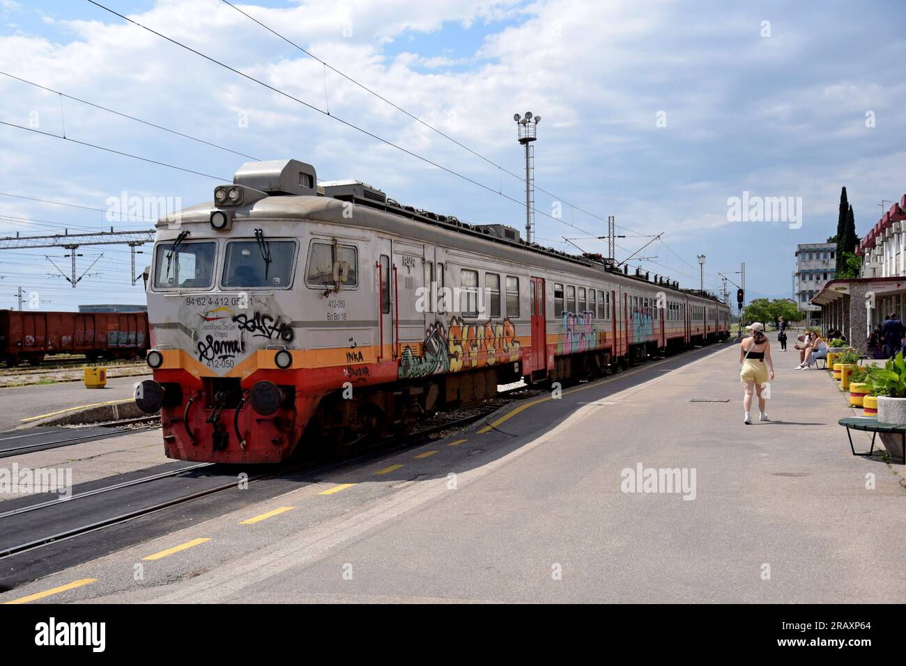 People catching trains at the main railway station, Podgorica, Montenegro Stock Photo