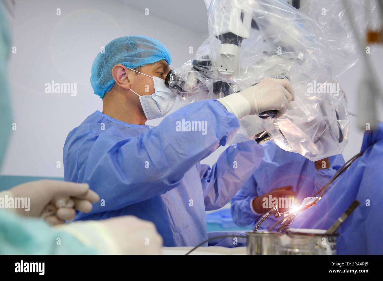 Treatment of a brain aneurysm. Surgical operation on the brain. A team ...